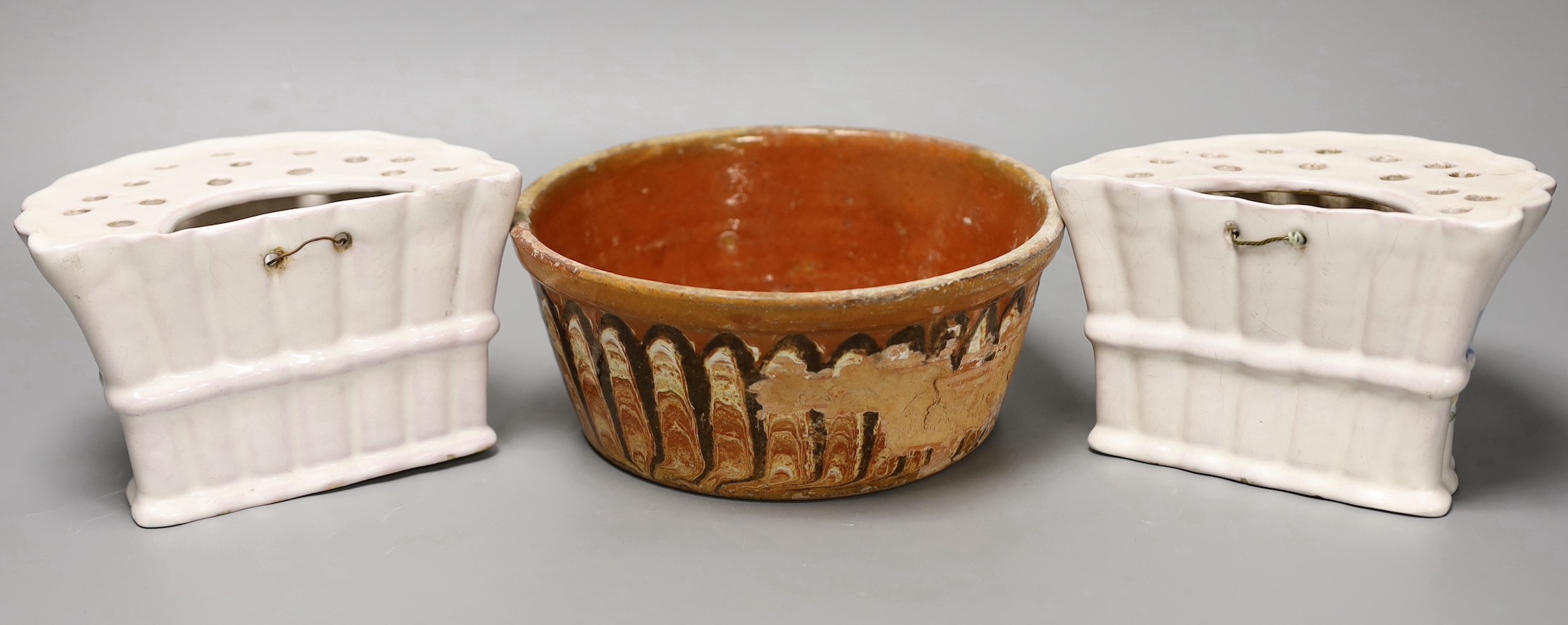 A Slipware conical bowl, 18th / 19th century, flaking to decoration, 19cm diameter